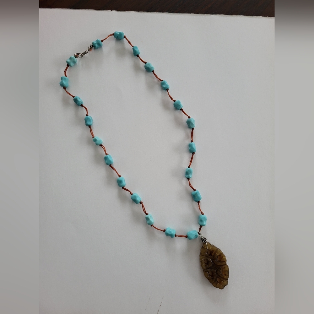 Necklace featuring turquoise nugget beads wth silver clasp. - Picture 2 of 7